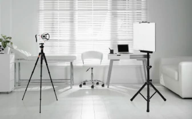REMEX-KA6 on a portable tripod stand in a clinic